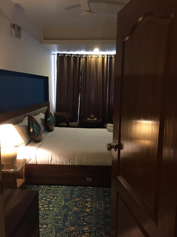 Luxtay Suites Bangalore Habitación foto